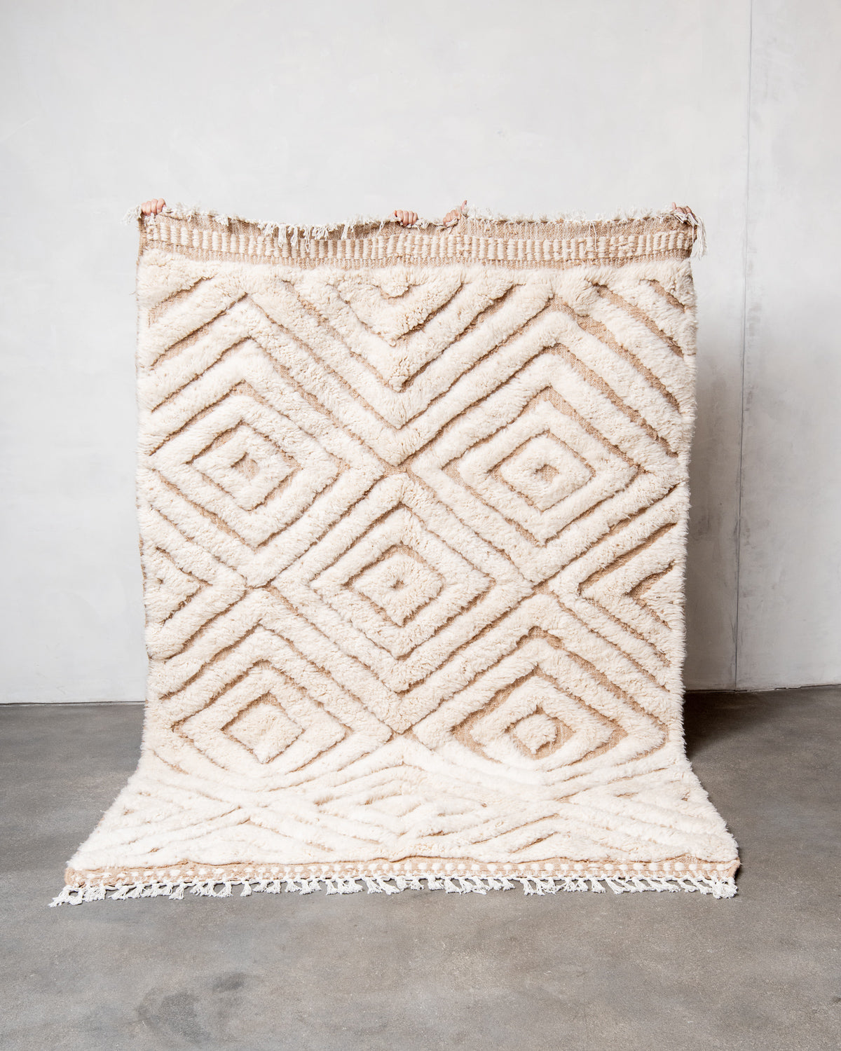 Modern, designer, handcrafted Berber rug from Morocco. Beniourain carpet with beautiful colours and patterns and fluffy wool texture.